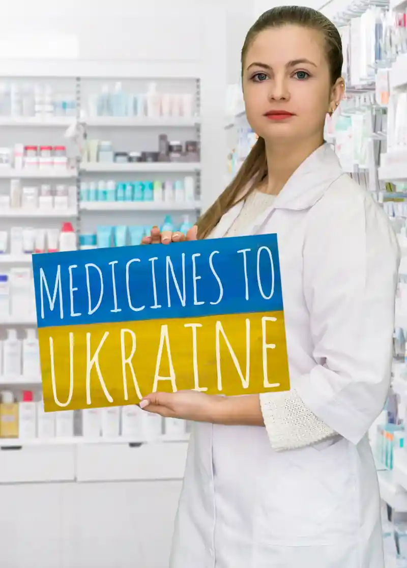 A person holding a Medicines to Ukraine poster